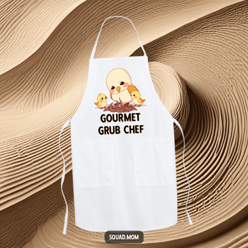 Funny apron design of a mama bird feeding worms to her chirping chicks, adding a touch of nurturing humor to kitchen duties.