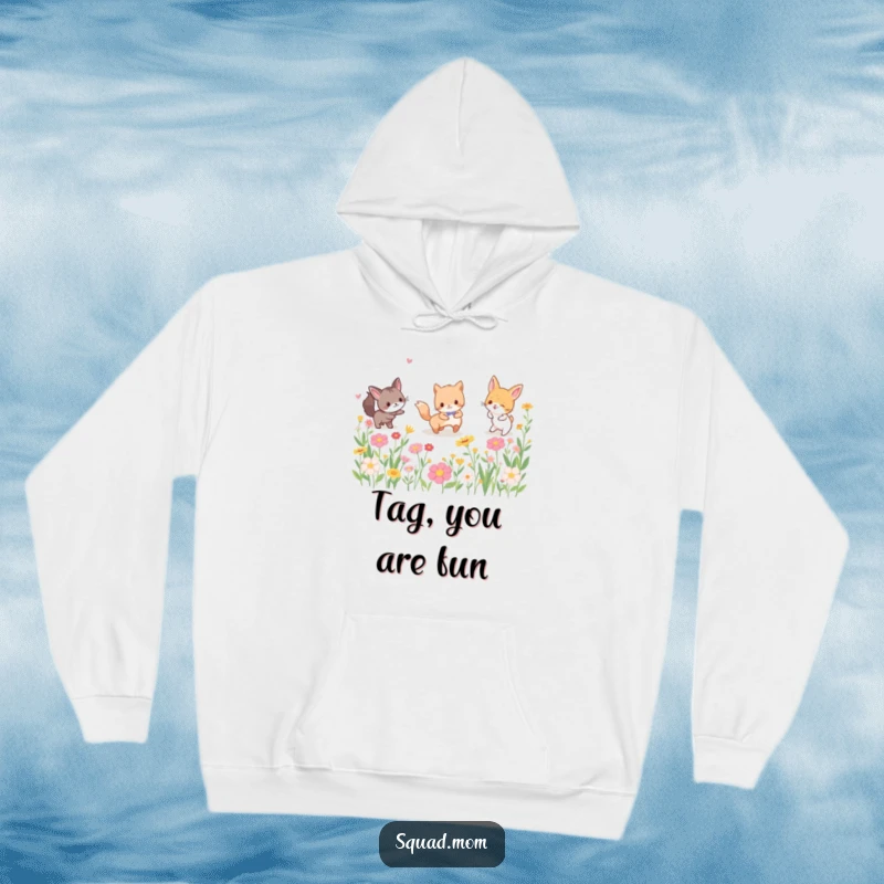 Funny hoodie showing playful animal friends engaged in a game of tag, surrounded by a colorful array of blooming flowers, perfect for outdoor enthusiasts.