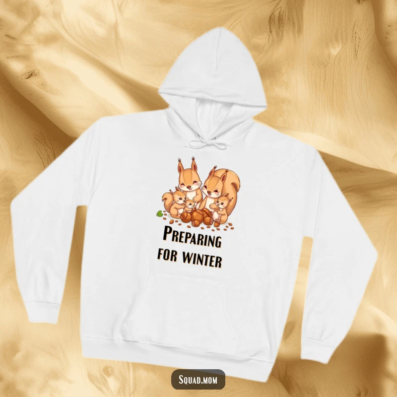 Funny and warm hoodie showing a mother squirrel and her babies enthusiastically gathering a large pile of acorns, a humorous gift.