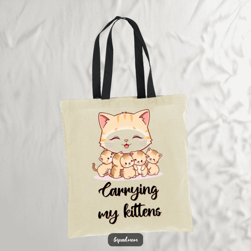 Funny Cat Mom Tote Bag featuring a happy mother cat meticulously grooming her adorable kittens, a charming and humorous accessory.