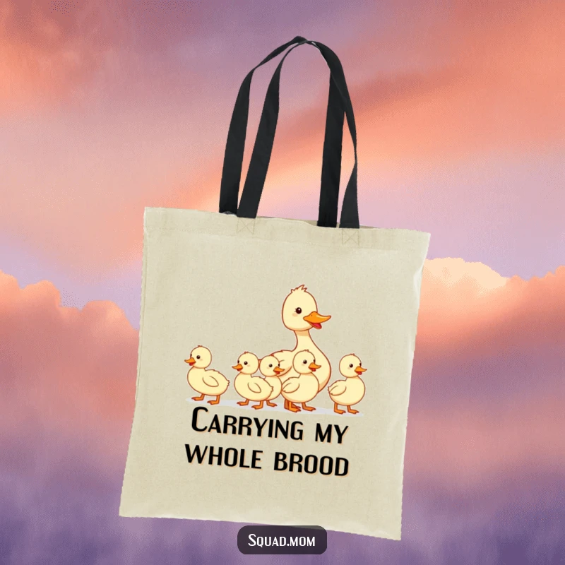 Funny tote bag with a mother duck leading her ducklings in a line, perfect for carrying groceries with a humorous touch.