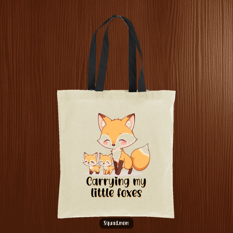 Funny tote bag featuring a mother fox leading her little kits through a whimsical setting, symbolizing guidance and family adventures.