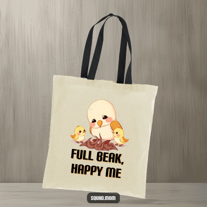 Funny tote bag featuring a mama bird character feeding worms to her chirping chicks, a sweet and humorous accessory for carrying daily items.