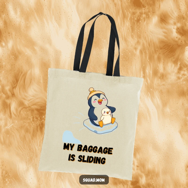 Funny penguin mom and chick sliding together on an icy hill, featured on a durable and humorous tote bag.